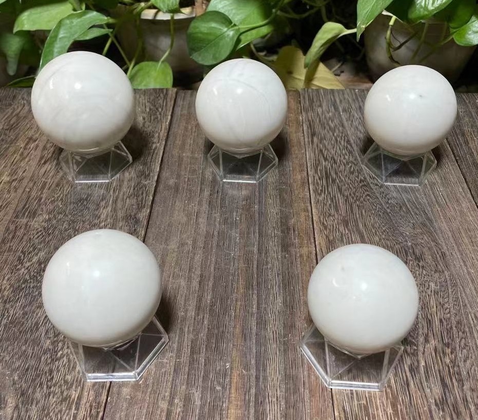 ivory jade spheres